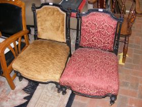 Two antique Victorian nursing chairs on turned sup