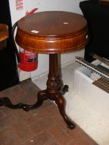 A Victorian mahogany circular teapoy on pedestal