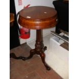 A Victorian mahogany circular teapoy on pedestal