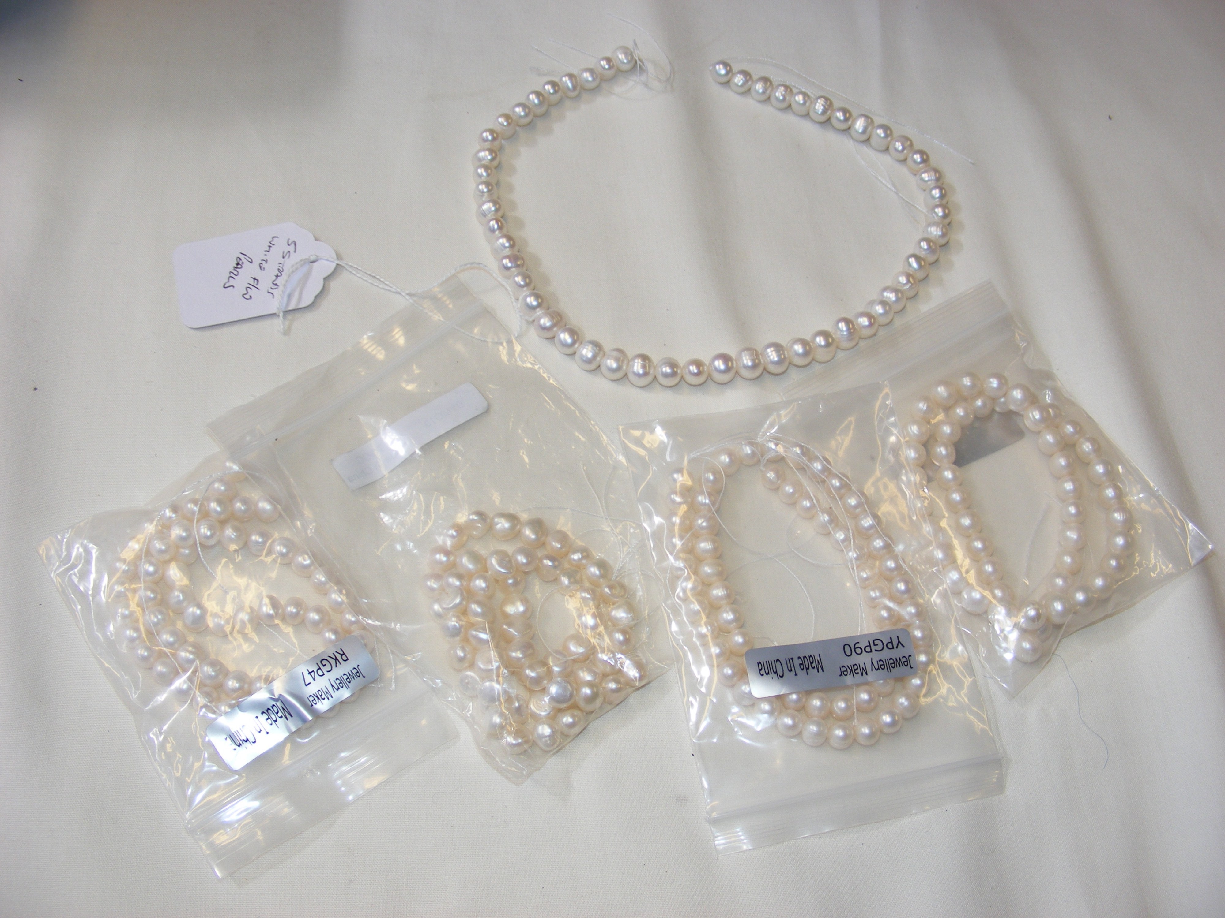 Five strands of white Freshwater pearls