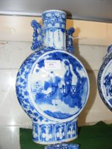 An antique Chinese blue and white moon vase with c