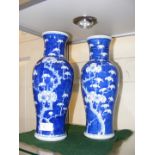 A pair of Chinese baluster vases with floral decor