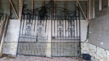 A pair of extremely large wrought iron gates, pain