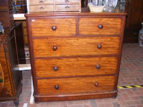 A Victorian mahogany chest of two short and three