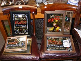 Assorted Pepsi and Coca Cola advertising mirrors