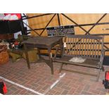 A hardwood garden set comprising two benches and a