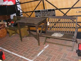 A hardwood garden set comprising two benches and a