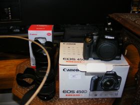 A Canon EOS 450D Camera with lenses and accessorie