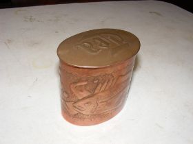 A Newlyn Arts & Crafts copper tea caddy, the top e