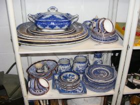 Assorted blue and white ware - on two shelves