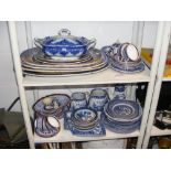 Assorted blue and white ware - on two shelves