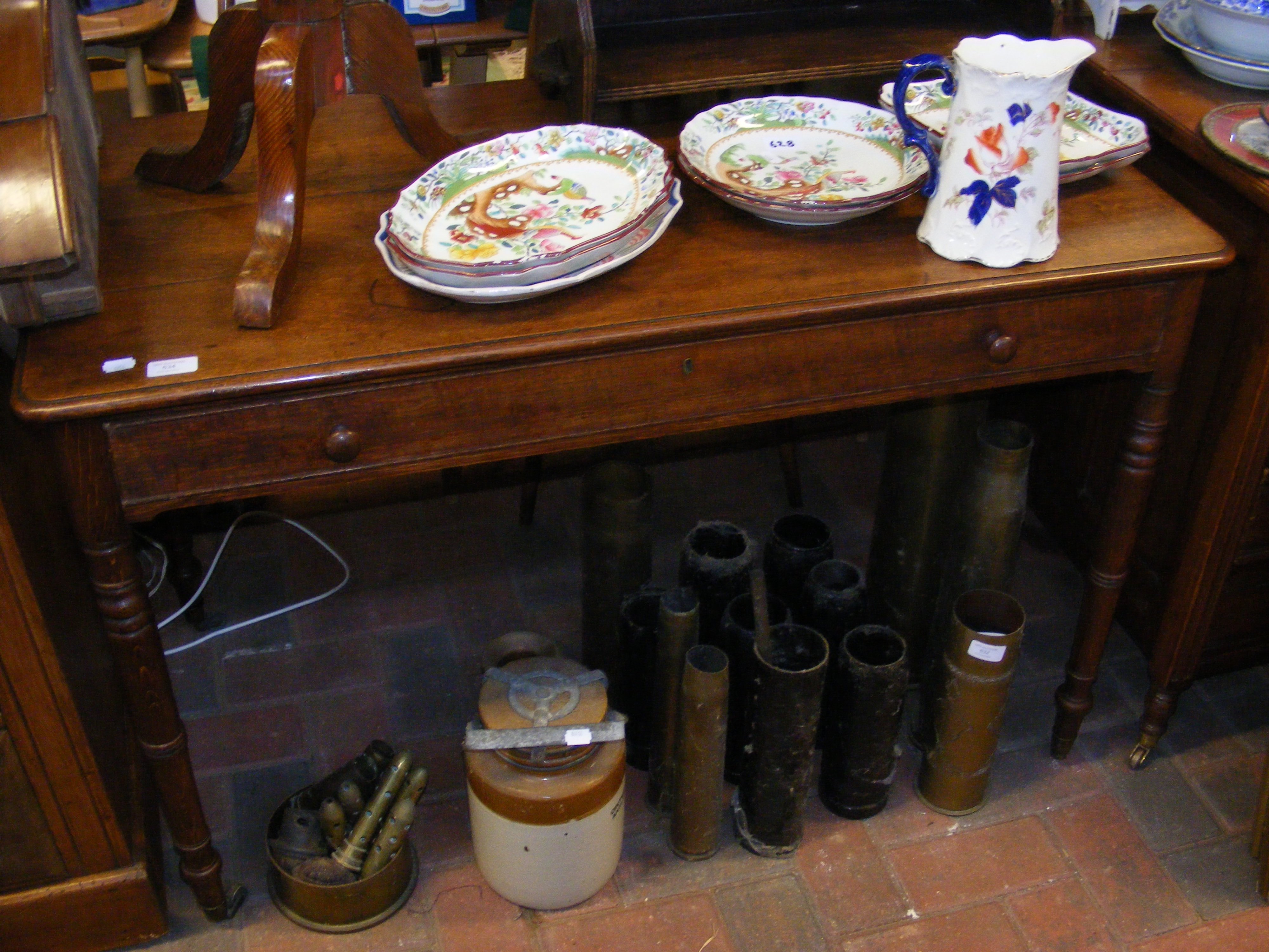 A Georgian oak side table with long drawer to fron