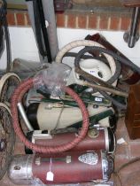 Assorted vintage vacuum cleaners, including Electr