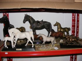 Assorted horse ornaments including bronzed sculptu