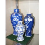A small blue and white Chinese vase with character