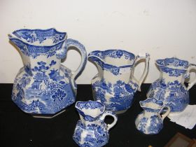 A graduated collection of Mason's Ironstone jugs