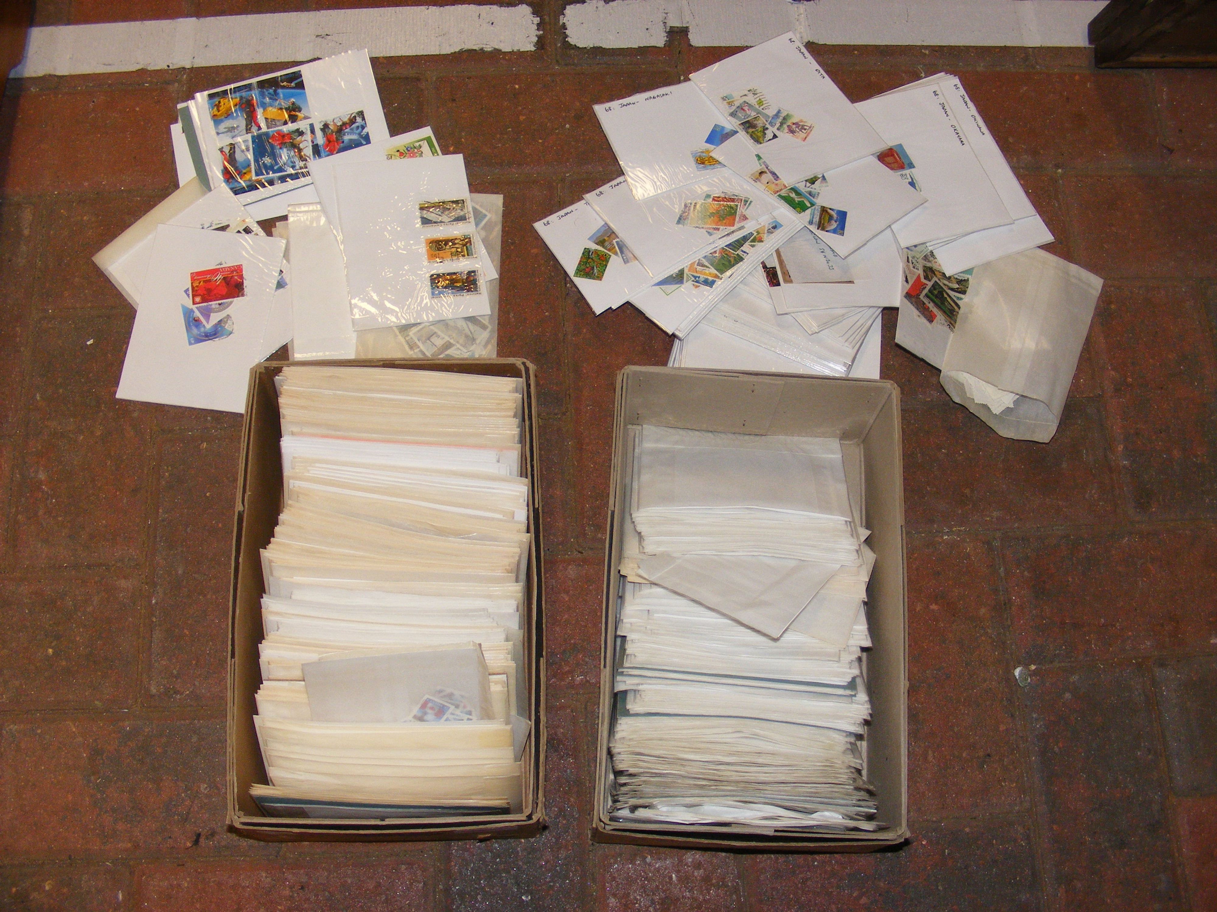 Washed and sorted stamps from Canada, USA, Japan a