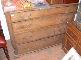 An oak chest of four drawers - width 117cm