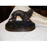 A reproduction bronze figure of hunting dog - 30cm