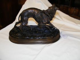 A reproduction bronze figure of hunting dog - 30cm