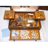 A jewellery box containing costume jewellery inclu