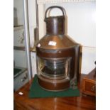 An antique copper ships starboard bow light by Ald