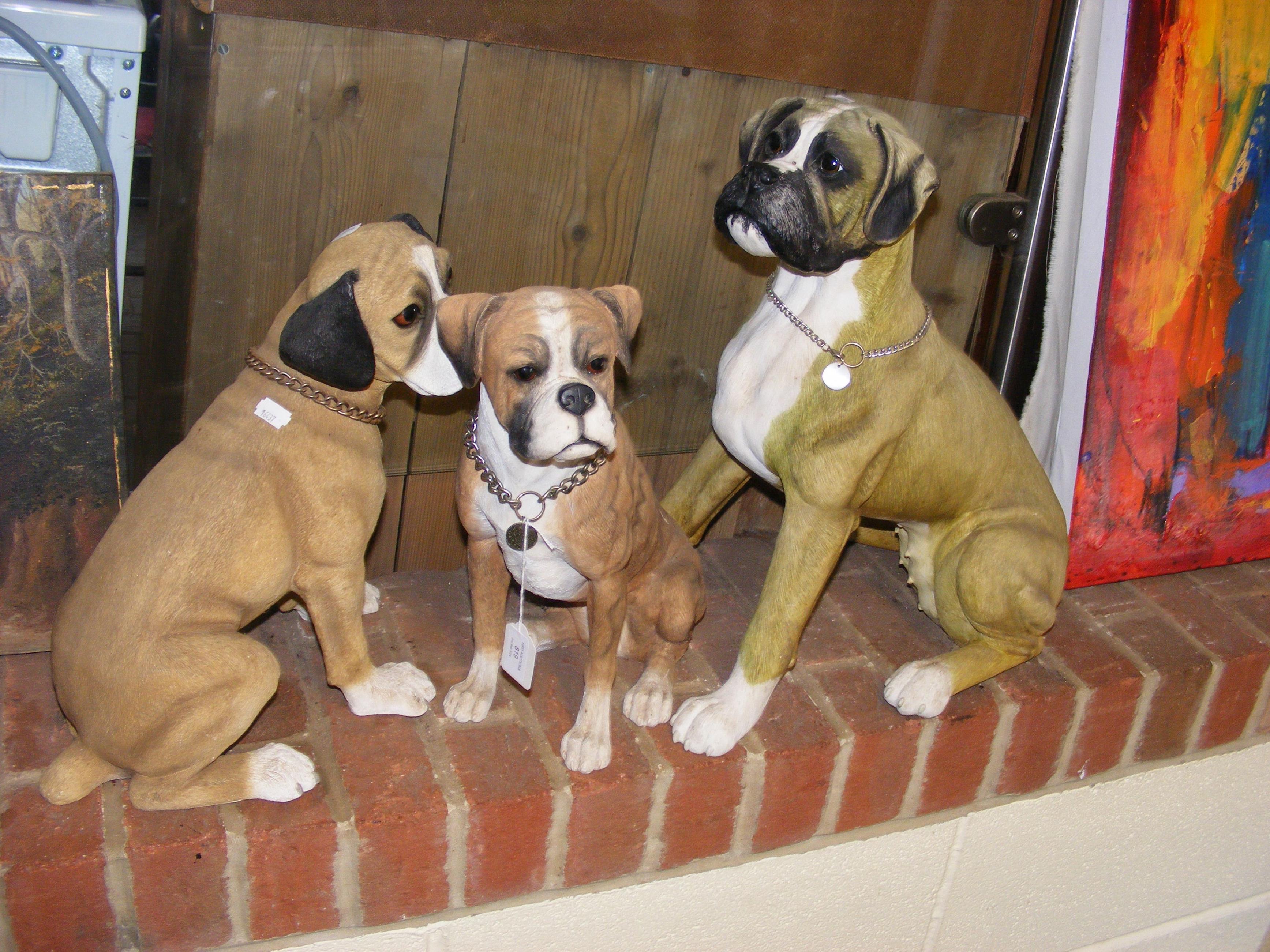 Three ornamental dogs