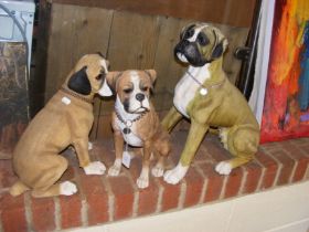 Three ornamental dogs