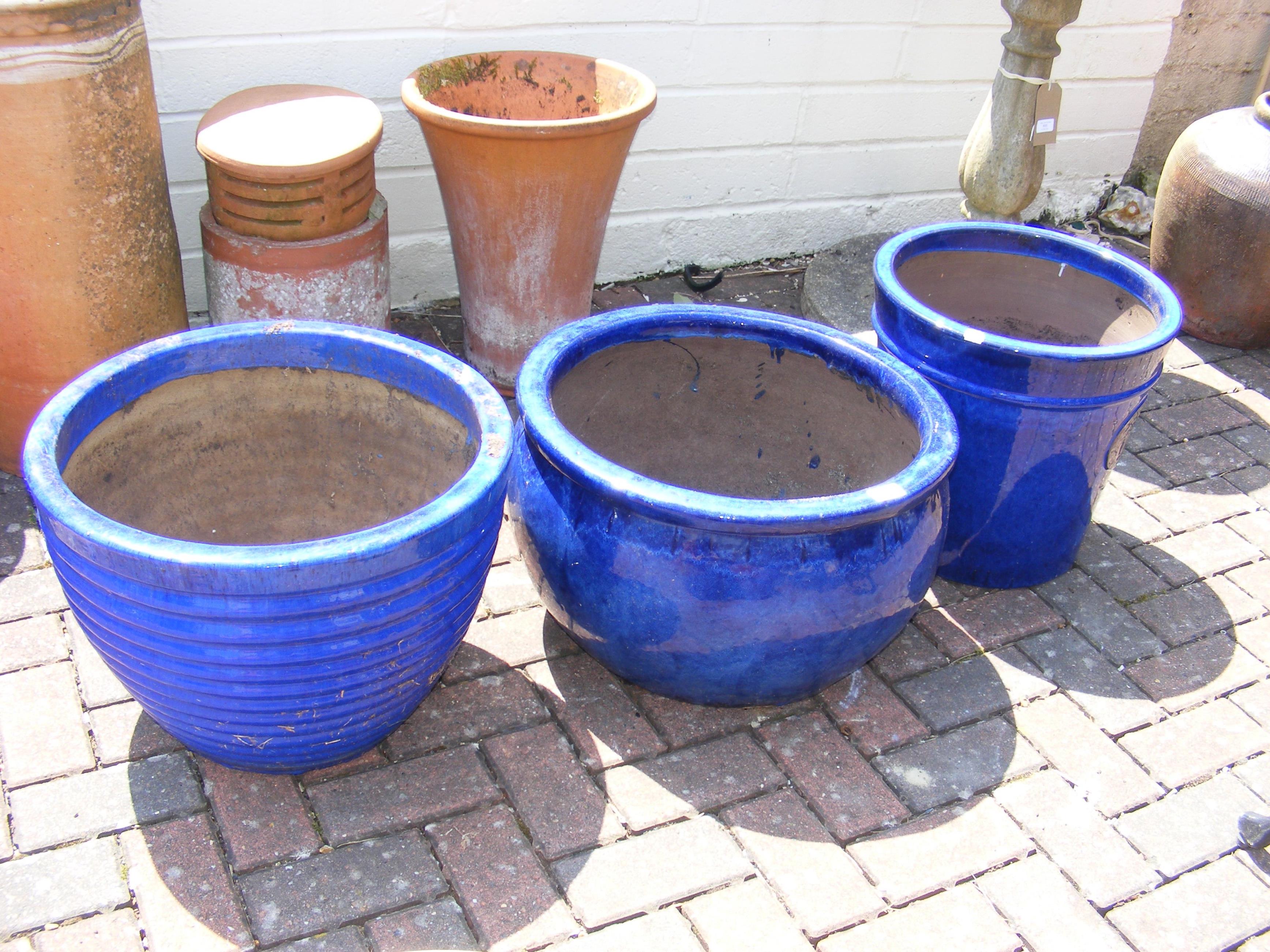 Three blue glazed garden pots of varyin