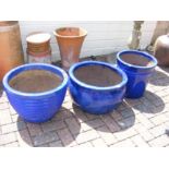 Three blue glazed garden pots of varyin