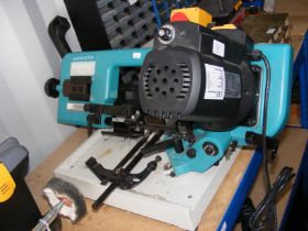 An Axminster bench mounted band saw