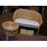 A cane two seater conservatory chair, together wit