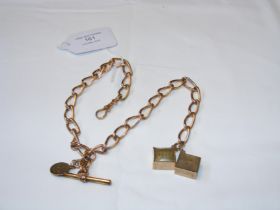 A 9ct watch chain with two charms