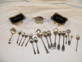 A silver mustard pot, spoons etc.