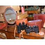 Two pairs of vintage binoculars, an oval toilet mi