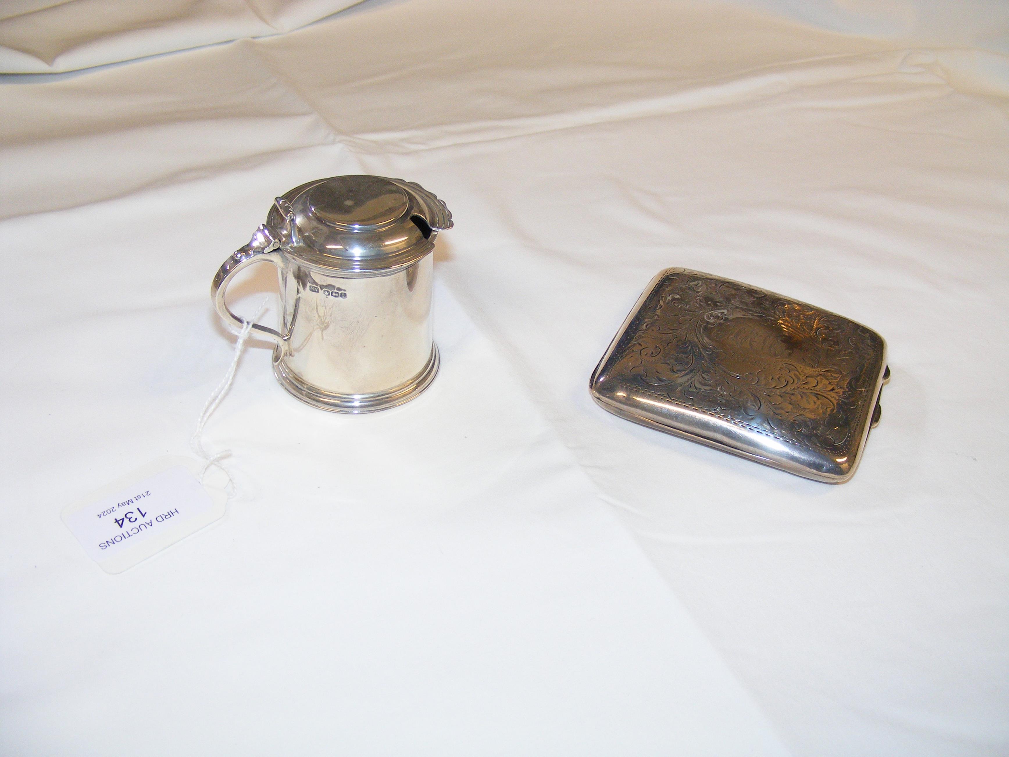 A silver mustard pot together with a cigarette cas