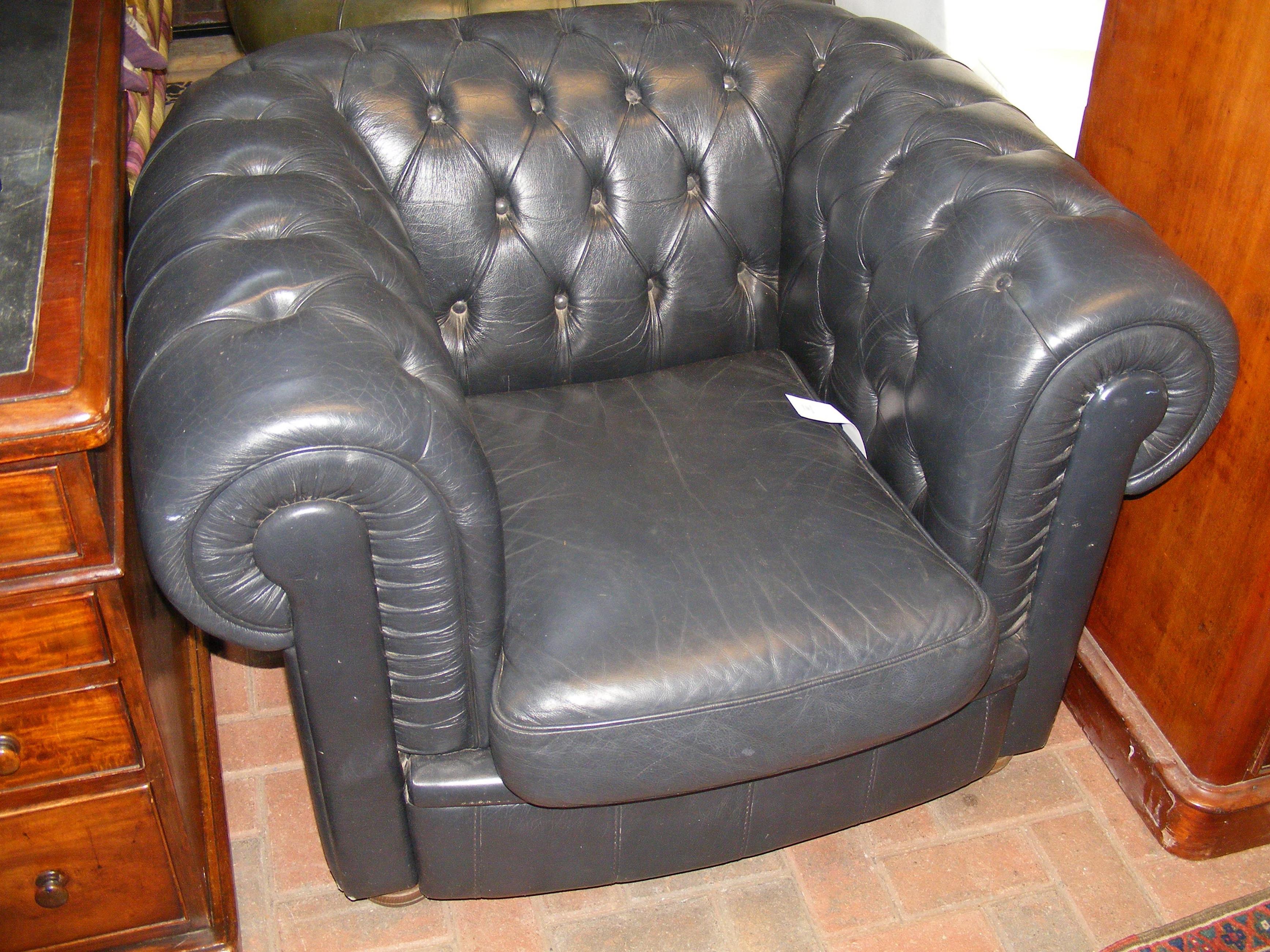 A Chesterfield style button back chair