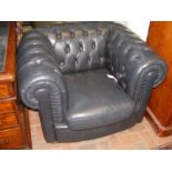 A Chesterfield style button back chair