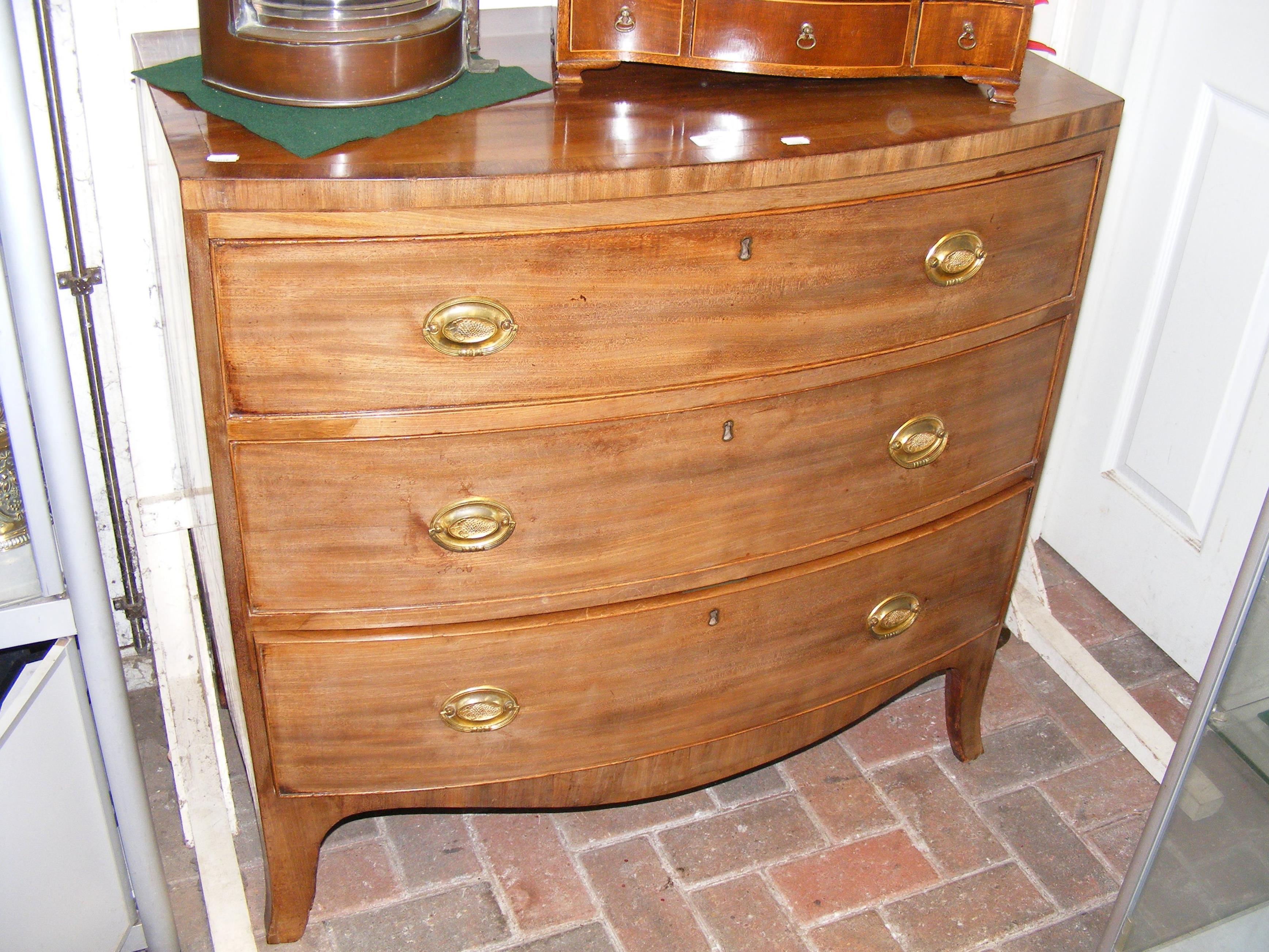 A 90cm antique mahogany bow front chest of drawers