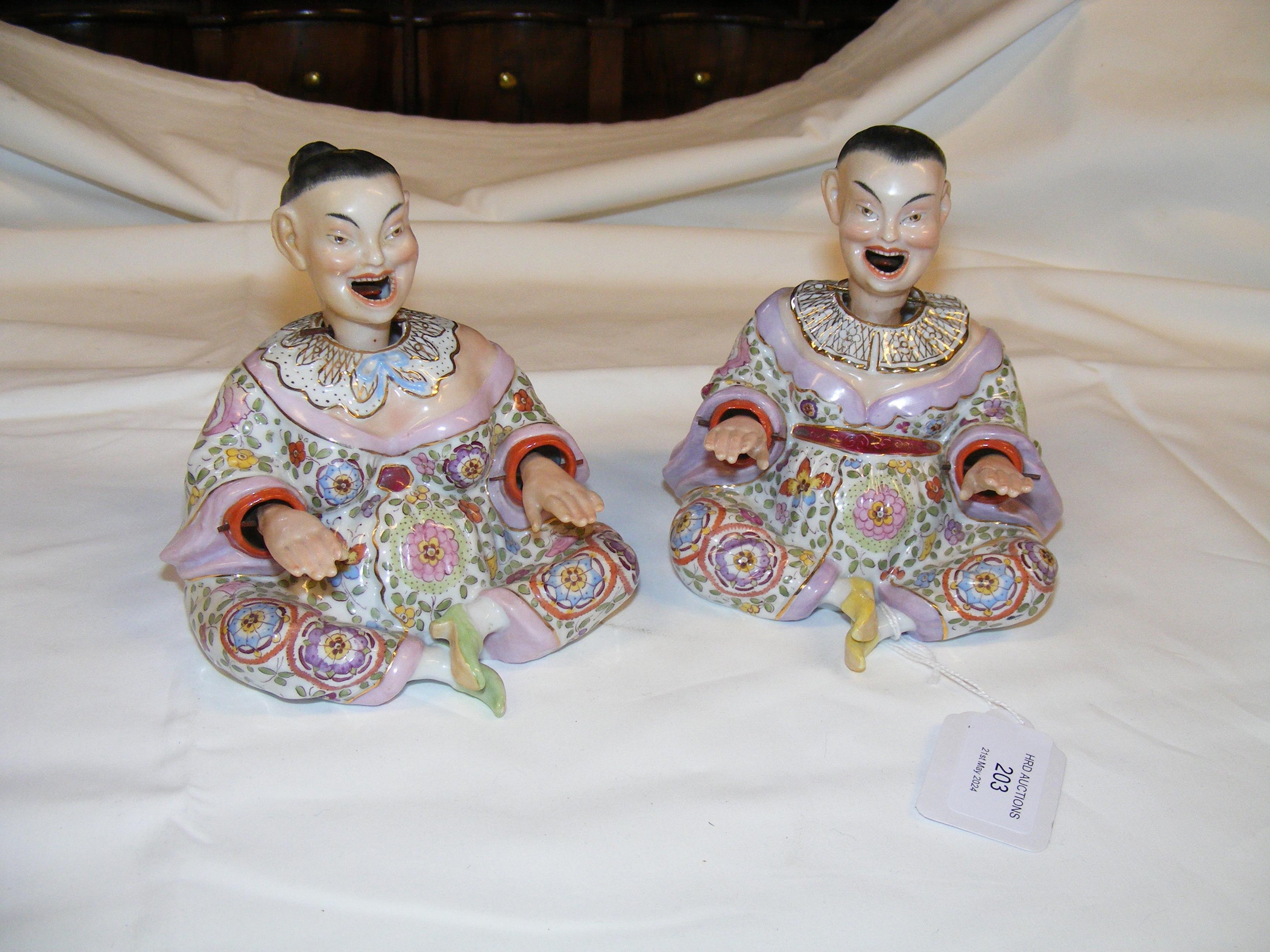 A pair of antique Chinese ceramic wedding figures