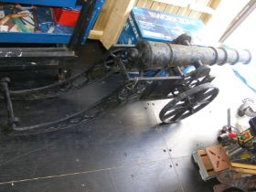 A reproduction cast metal cannon on wheels - 160cm