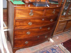 An antique mahogany bow front chest of drawers - 1