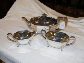 A three piece silver tea set
