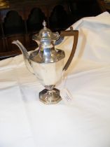 A 21cm high silver water jug with London hallmark
