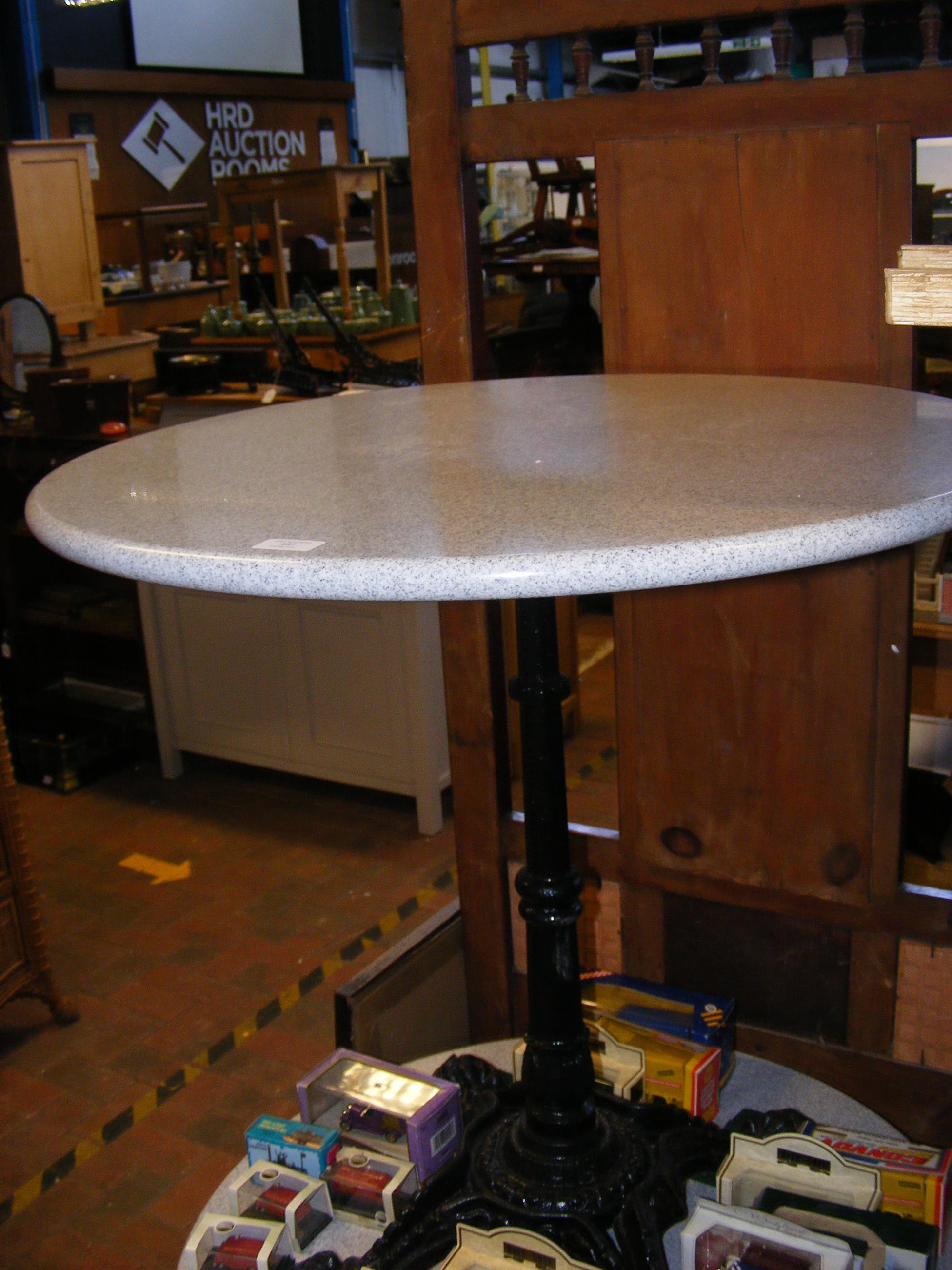 A white granite terrazzo effect bistro table, with