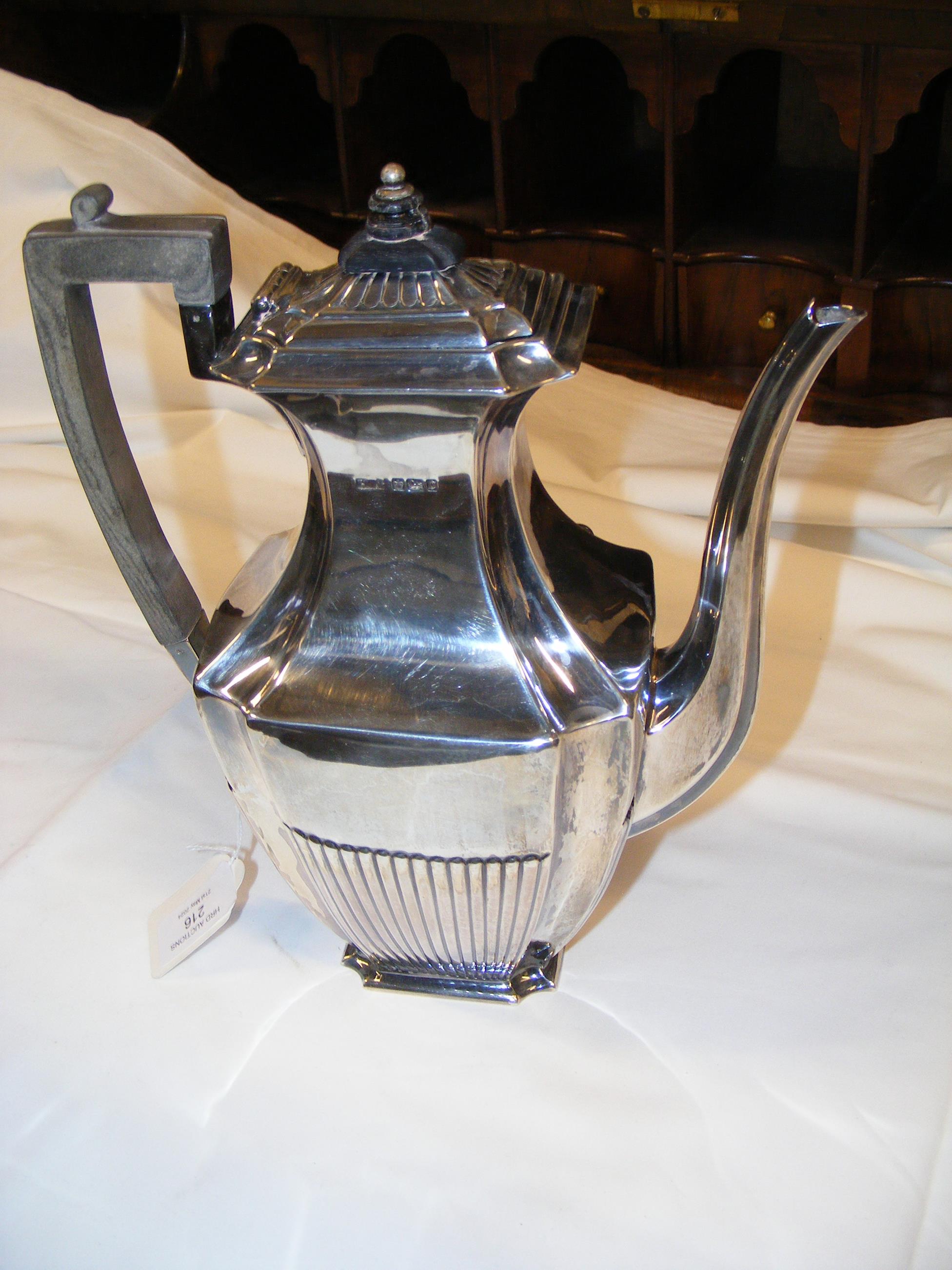 A 25cm silver coffee pot