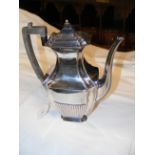 A 25cm silver coffee pot