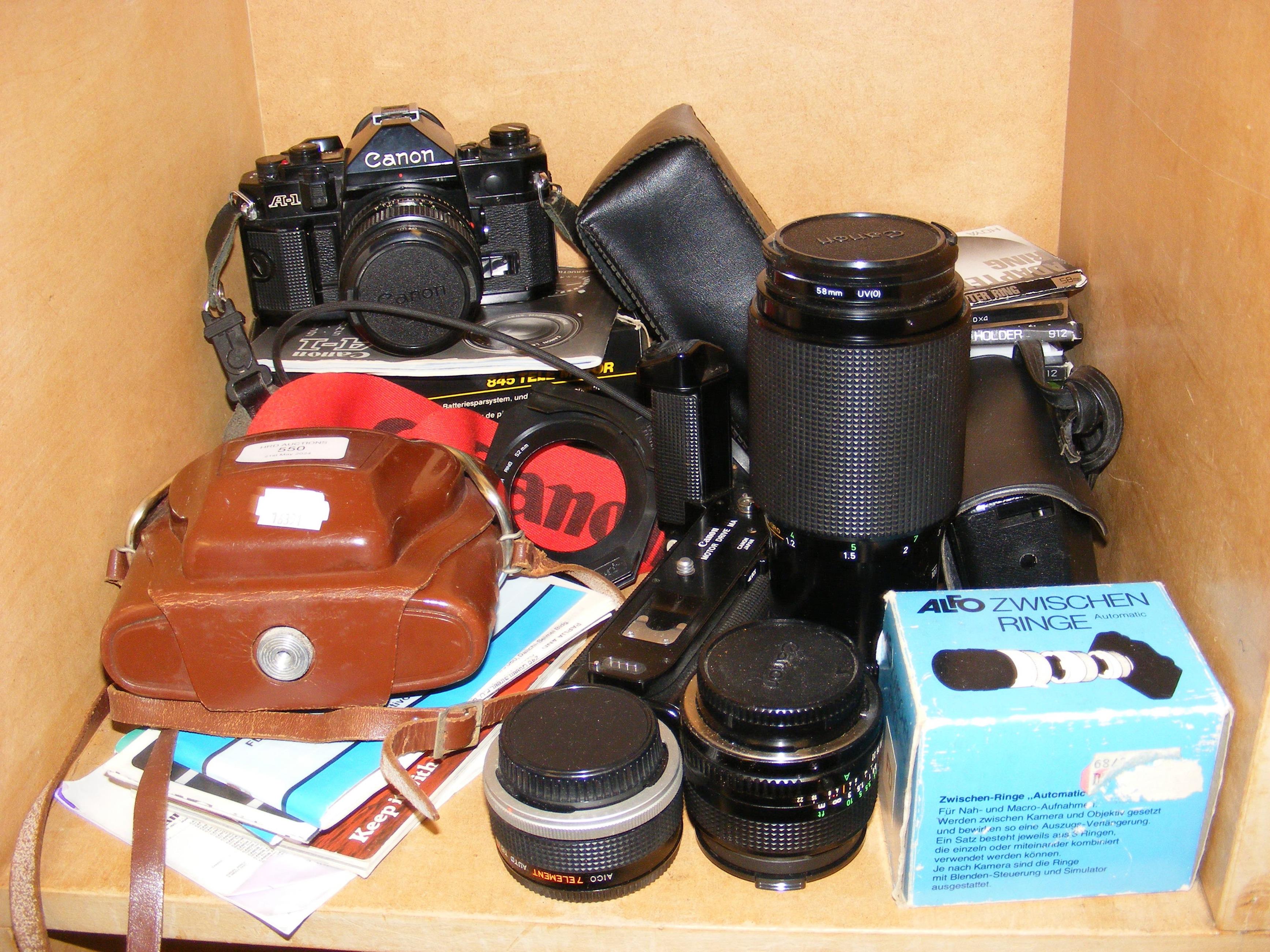 Vintage photographic equipment, including Canon A-