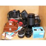 Vintage photographic equipment, including Canon A-