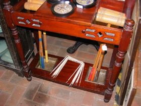 A croquet set consisting of six clubs and nine hoo